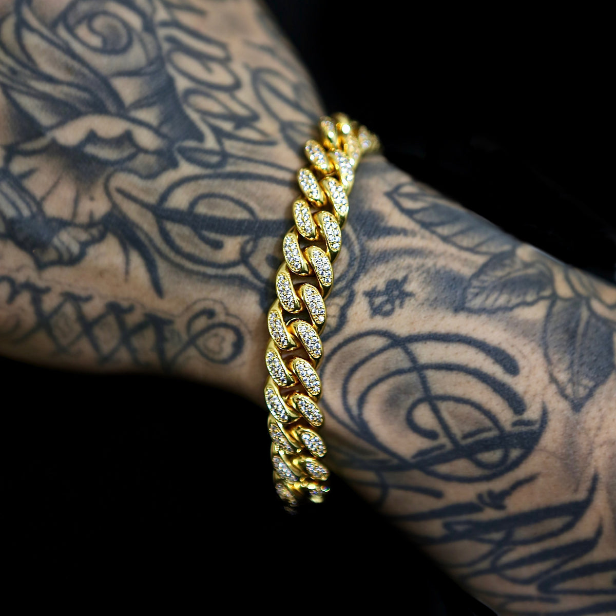 12mm Iced Out Cuban Link Bracelet - 18K Yellow Gold · male-model
