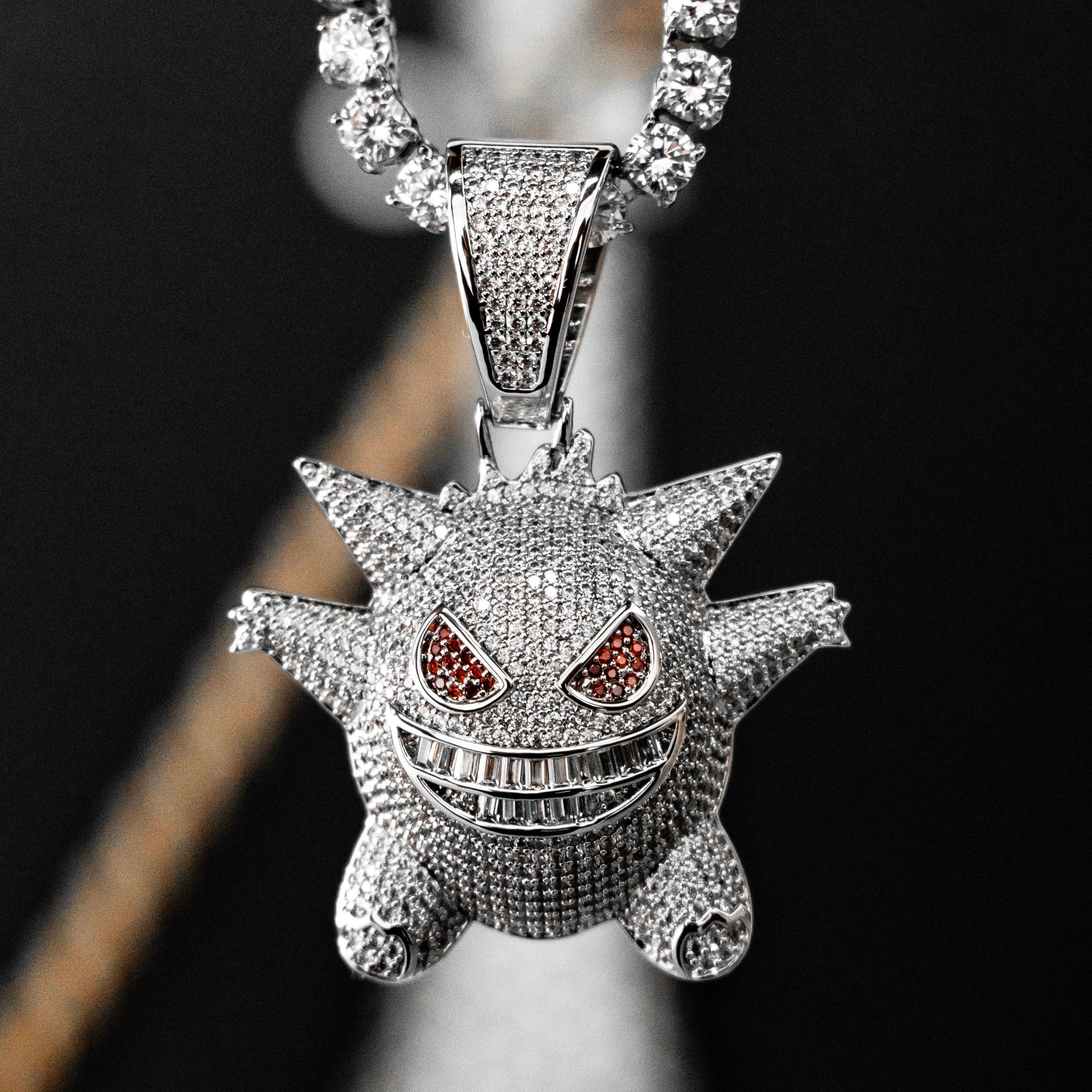 Close-up of SKRT iced-out jewelry showing stone detail