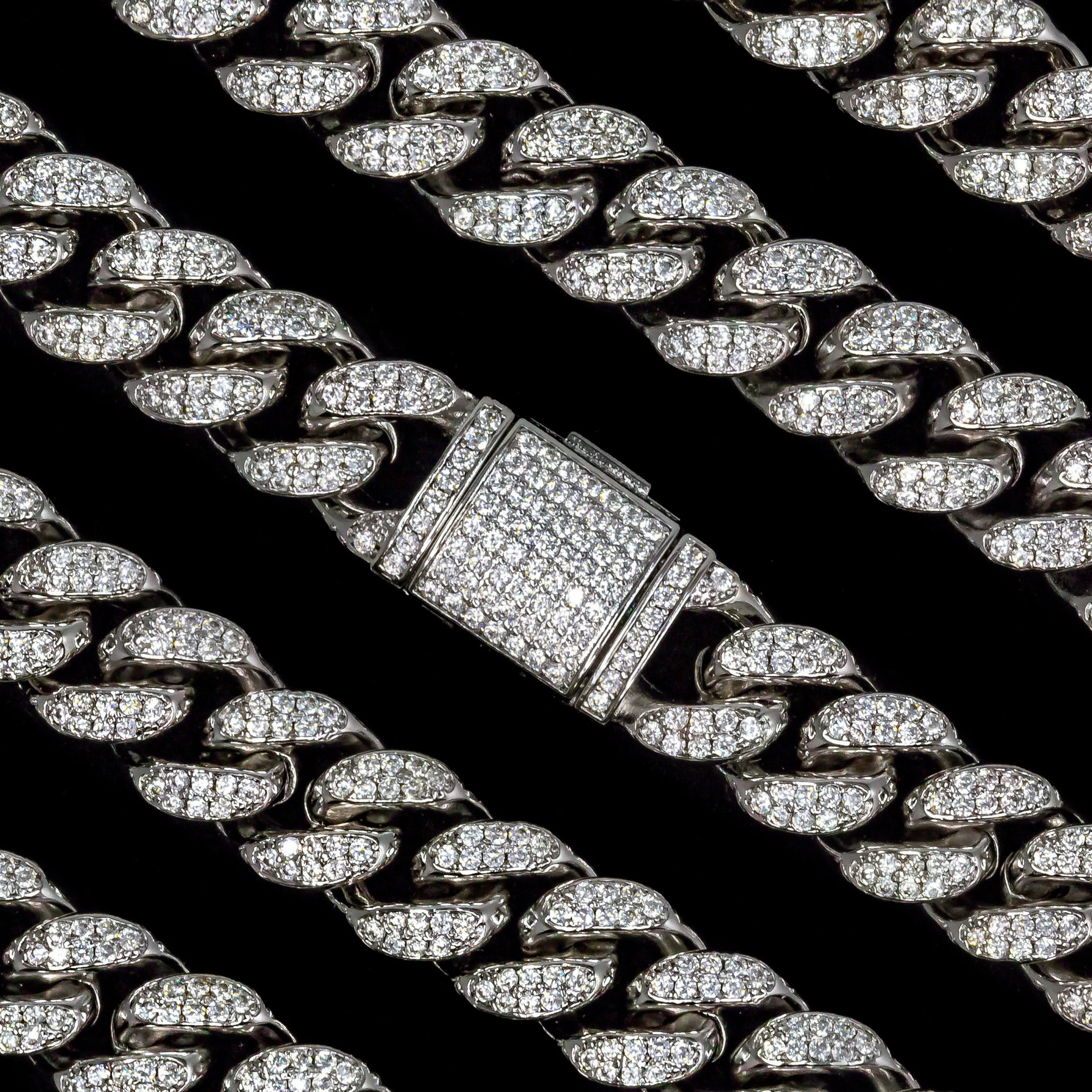 12mm Iced Out Cuban Link Bracelet in White Gold · male-model