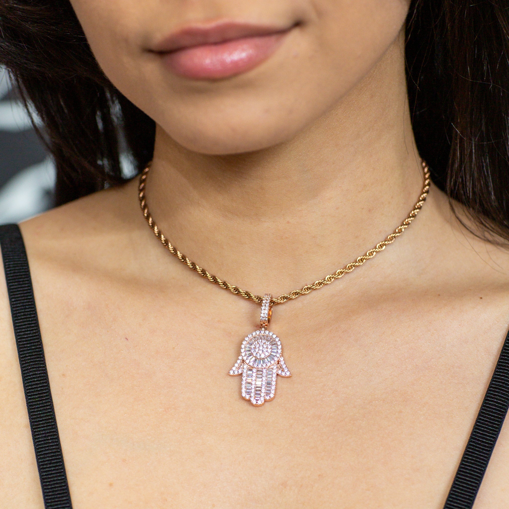 Iced Out Baguette Diamond Hamsa Hand in Rose Gold (view 6 of 6) · female-model
