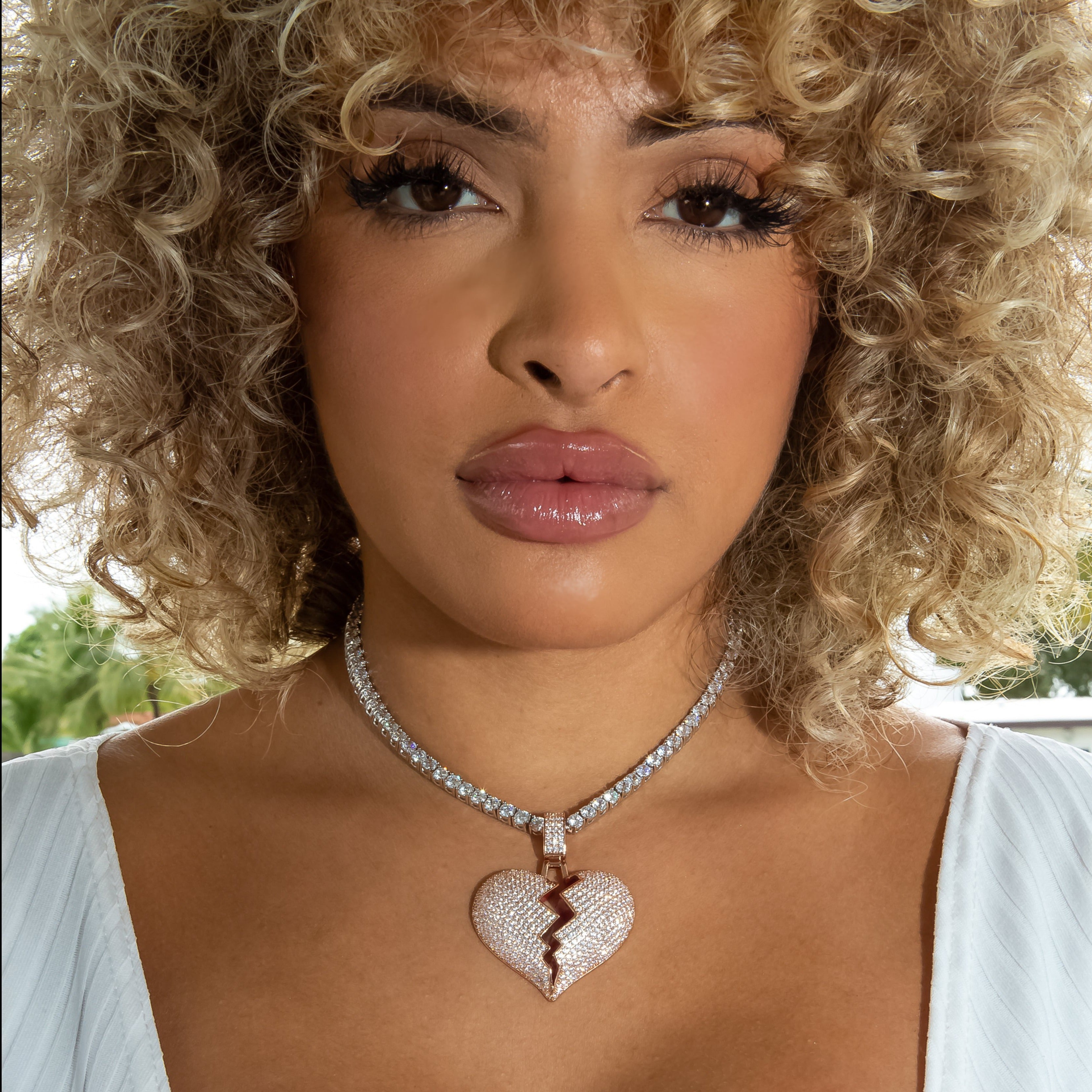 Iced Out Diamond Broken Heart in Rose Gold (view 4 of 4) · female-model