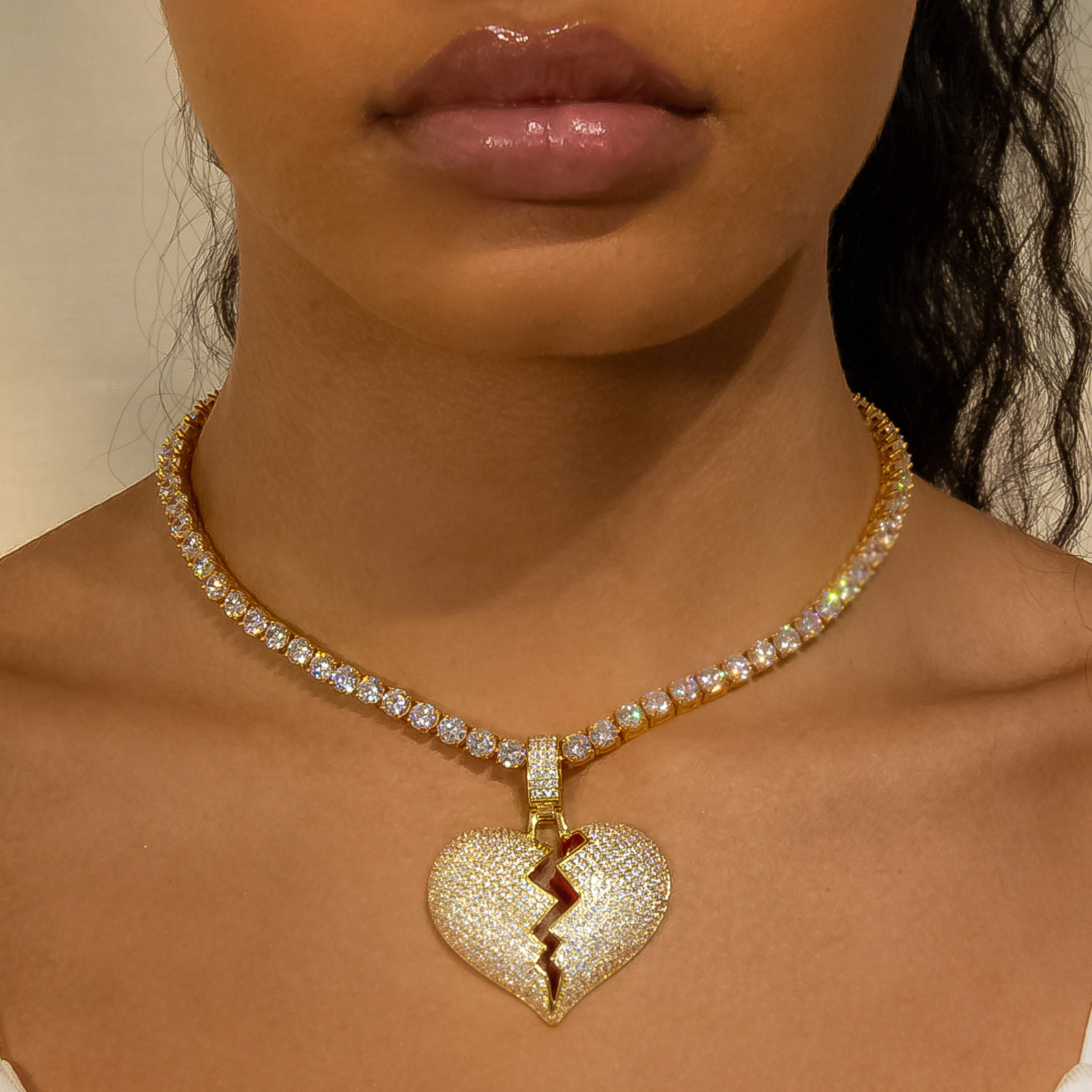 Iced Diamond Broken Heart In Yellow Gold (view 3 of 7) · female-model