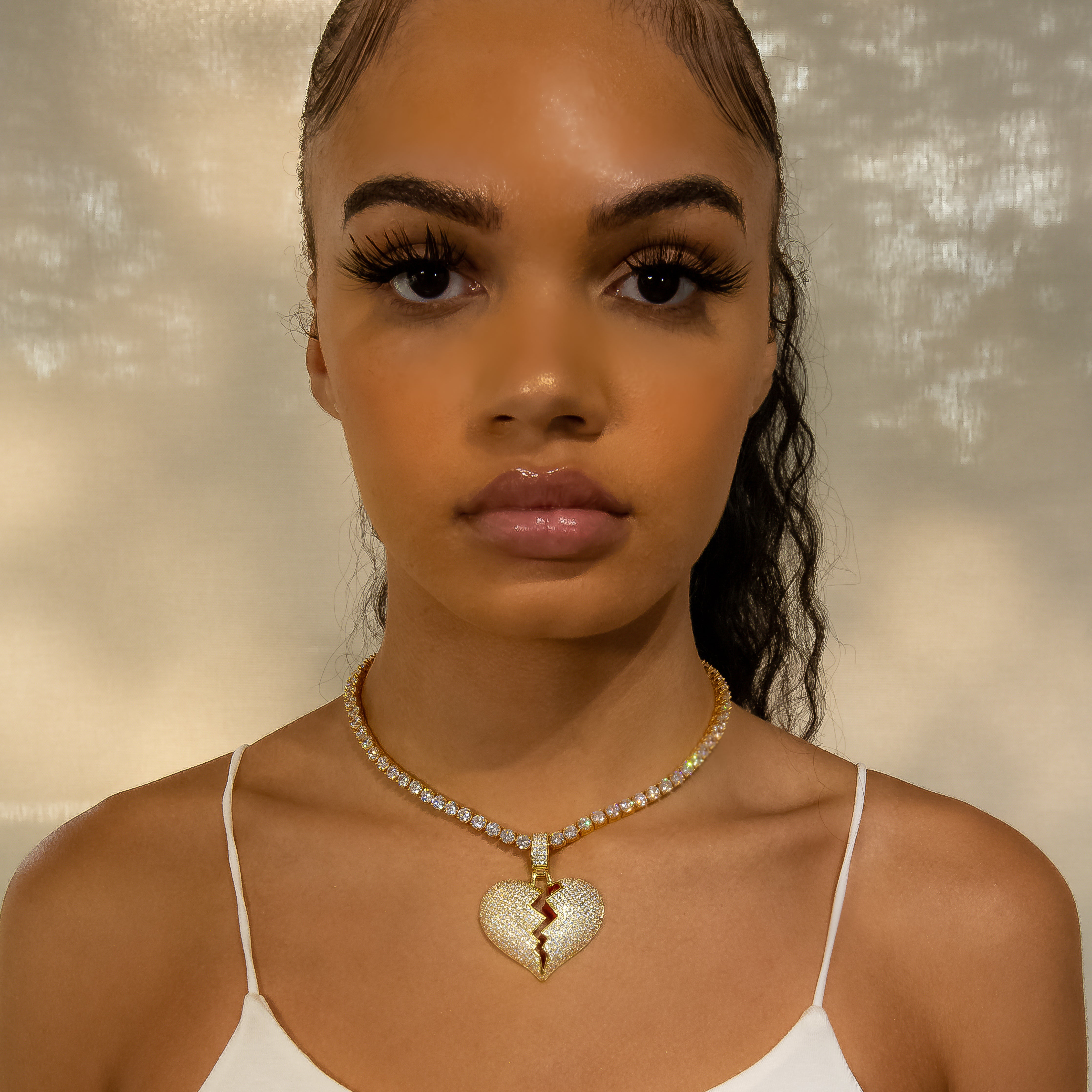 Iced Diamond Broken Heart In Yellow Gold (view 4 of 7) · female-model