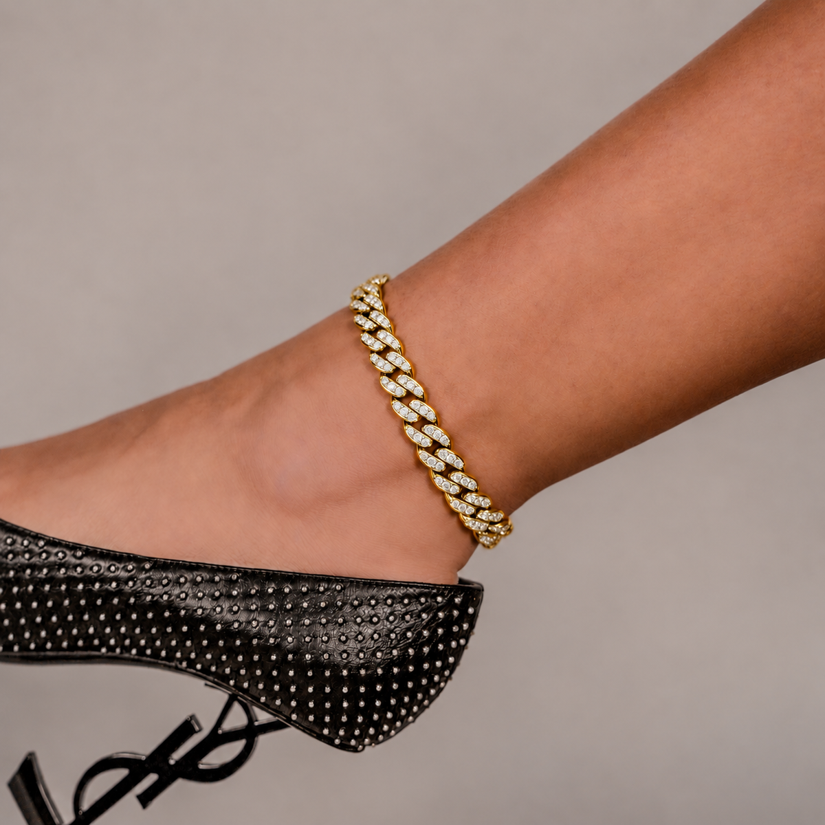 SKRT 8mm Cuban Link Anklet in Yellow Gold shown on an ankle.