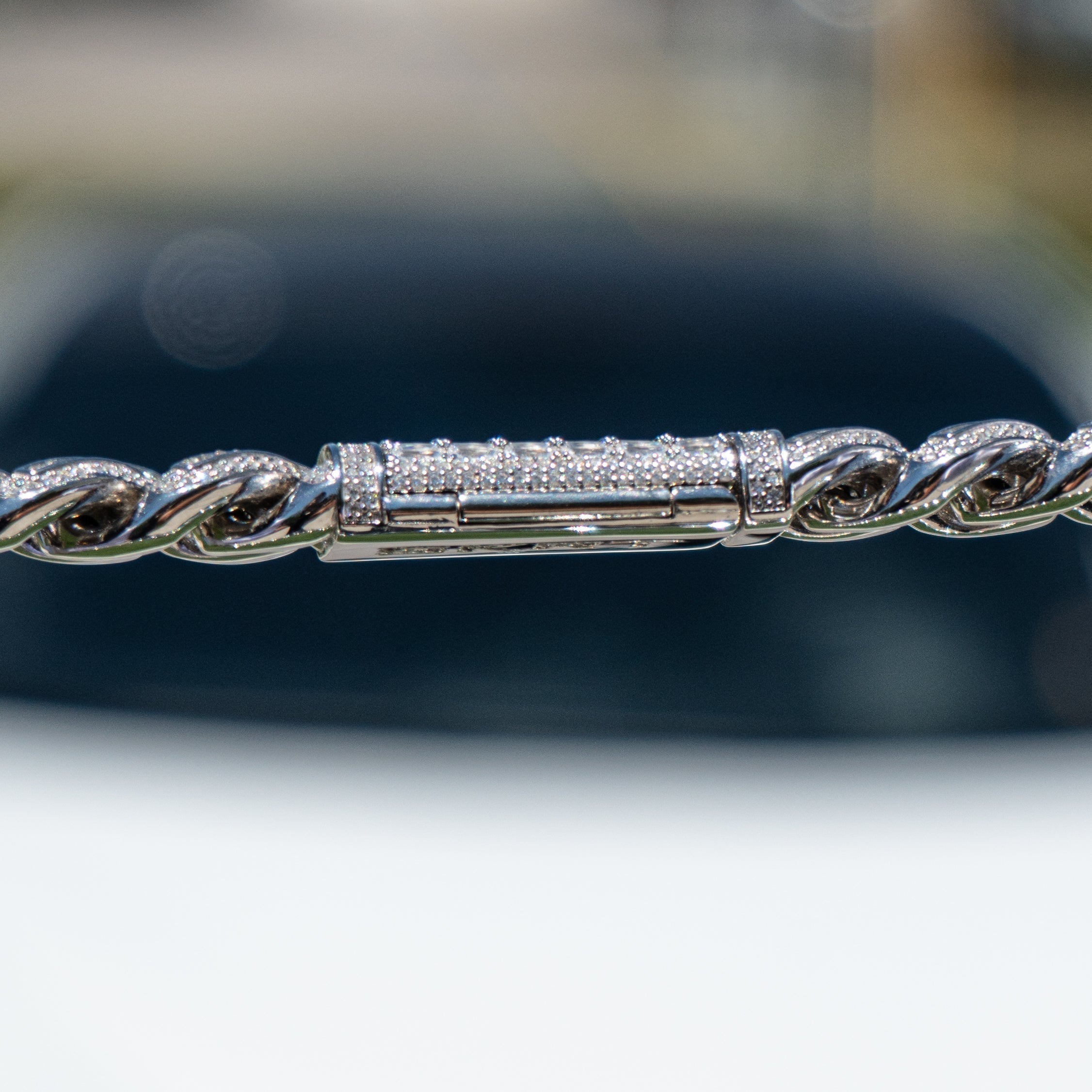 Iced out Bugatti link chain in White Gold