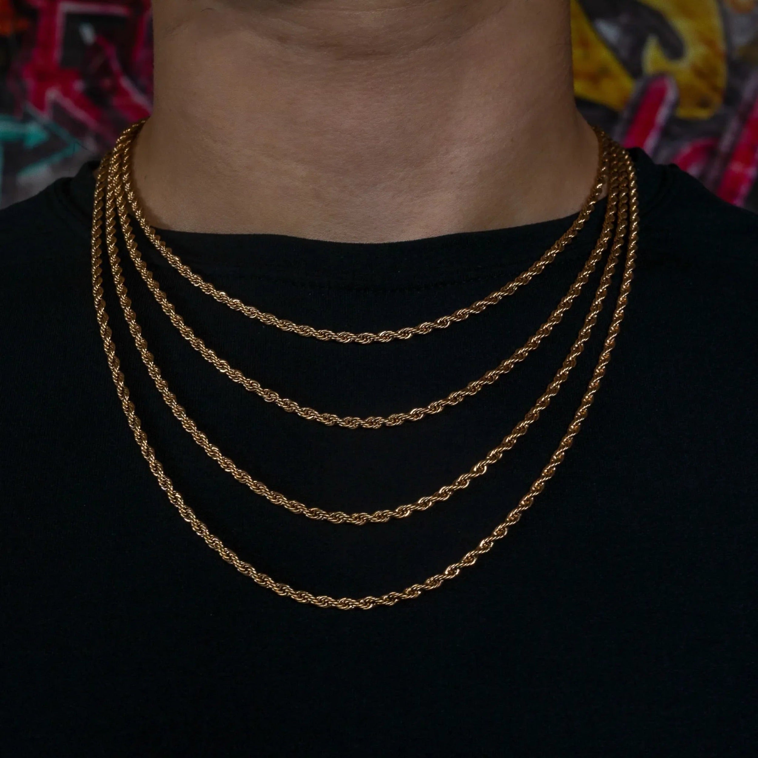 Layered Rose Gold rope chains worn on the neck