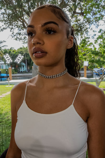 12mm Cuban Link Choker on model - 18K White Gold (side angle) · female-model