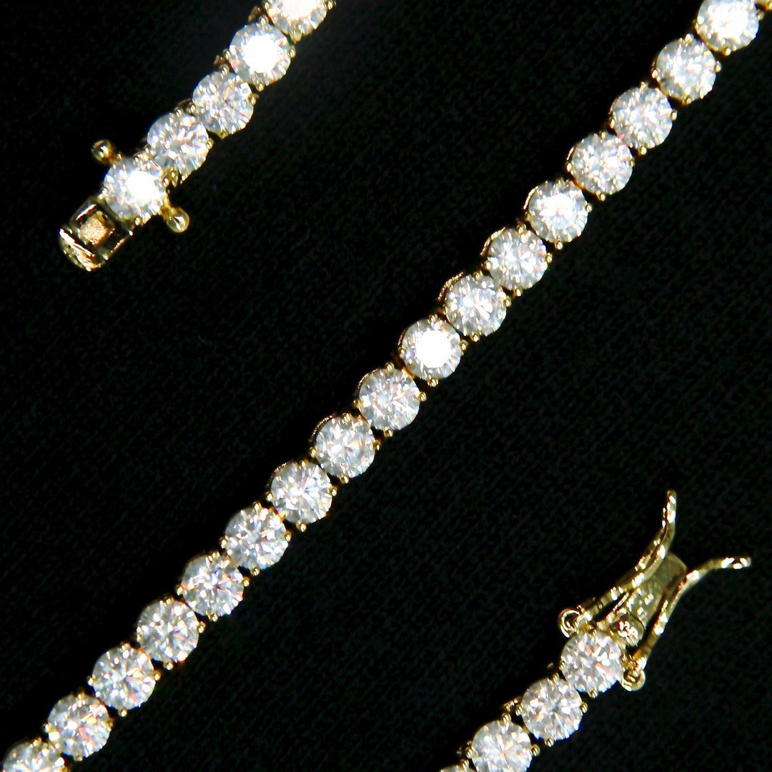 SKRT 4mm Tennis Anklet in Yellow Gold, original product studio detail on black background