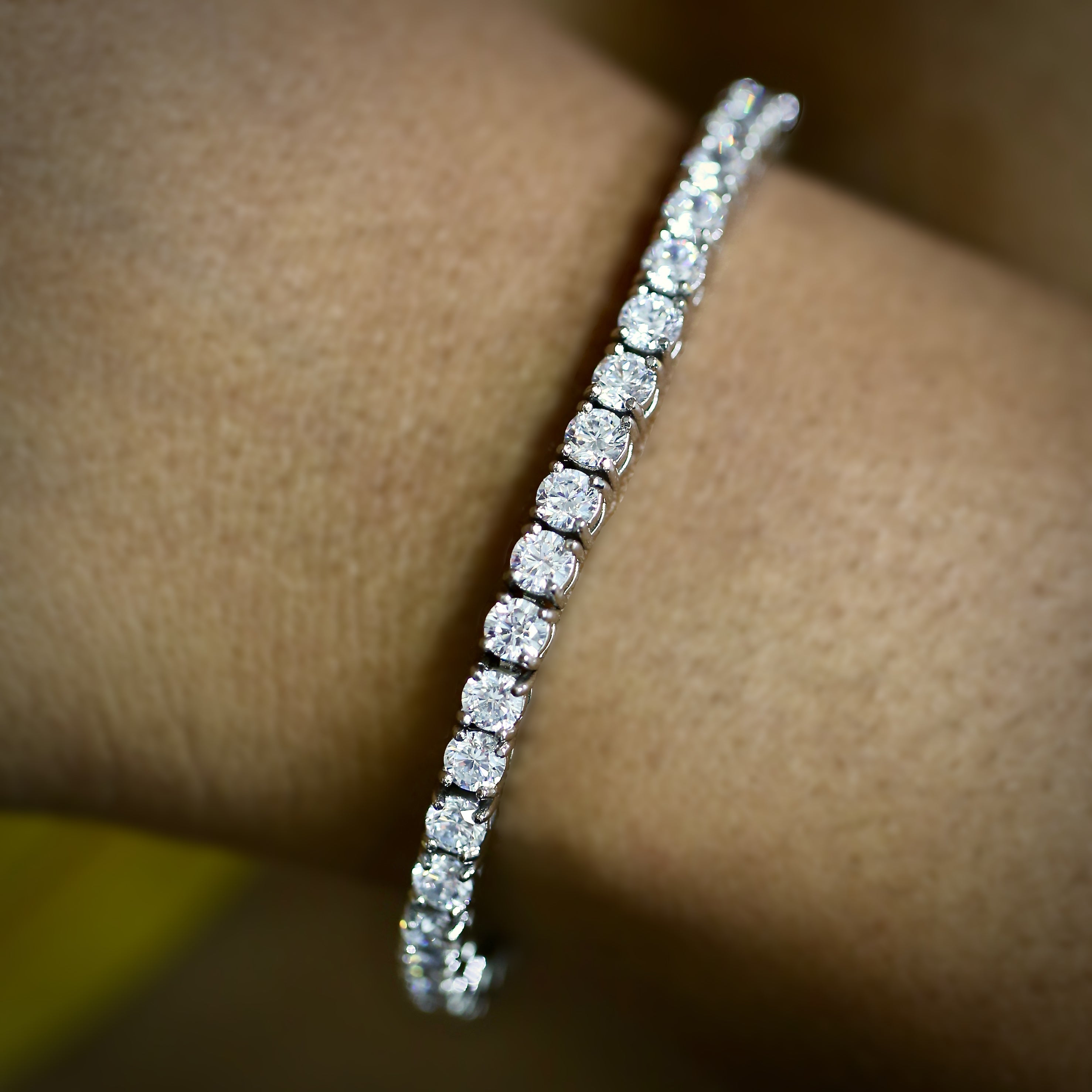 4mm White Gold Diamond Tennis Bracelet (view 4 of 4) · female-model