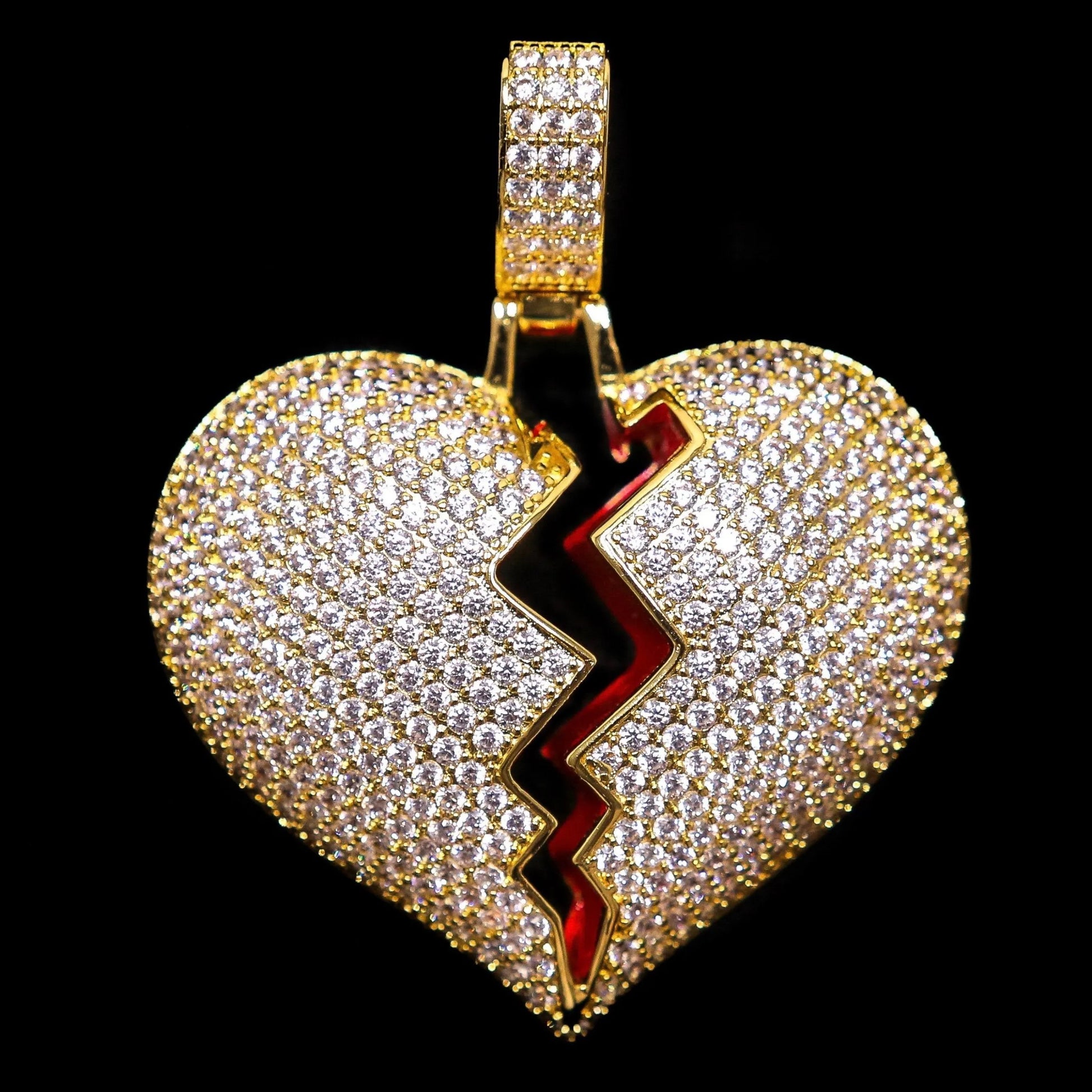 Iced Out Broken Heart In Yellow Gold