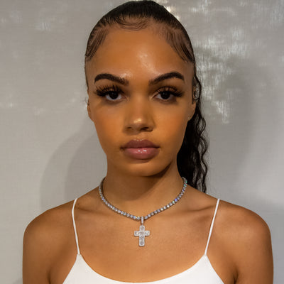 Iced Out Baguette Diamond Cross in White Gold (view 2 of 7) · female-model
