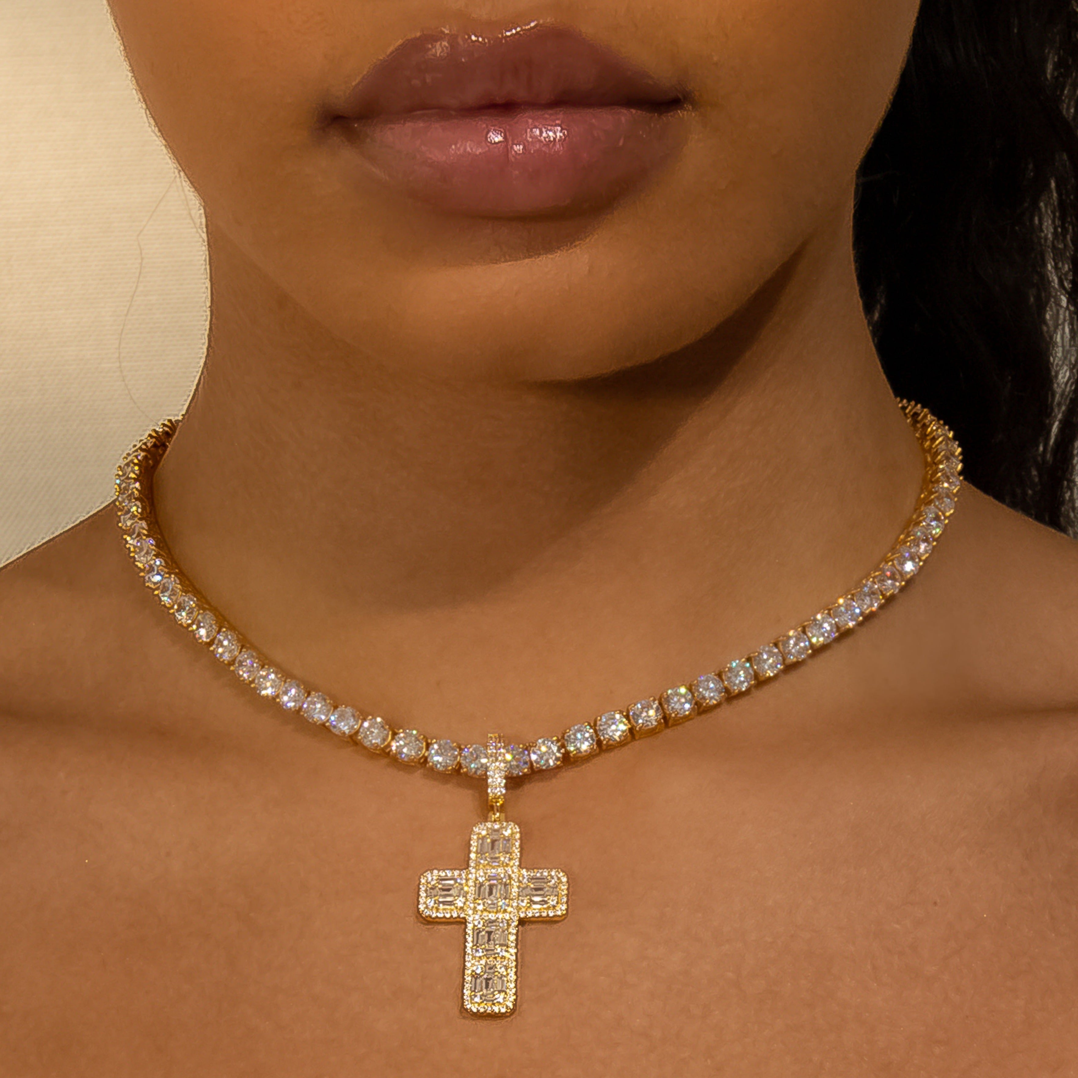 Iced Baguette Diamond Cross in Yellow Gold (view 3 of 6) · female-model