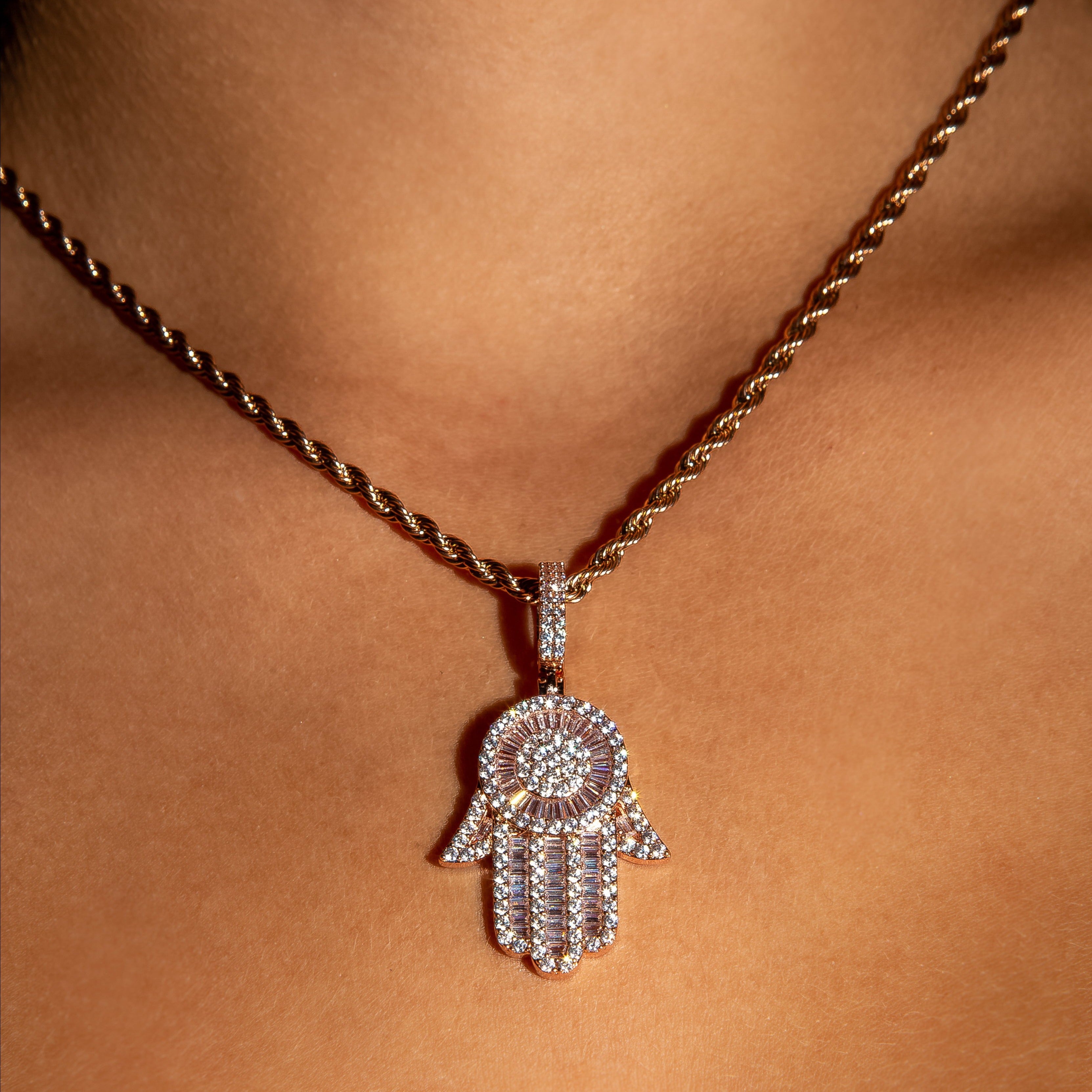 Iced Out Baguette Diamond Hamsa Hand in Rose Gold (view 4 of 6) · female-model