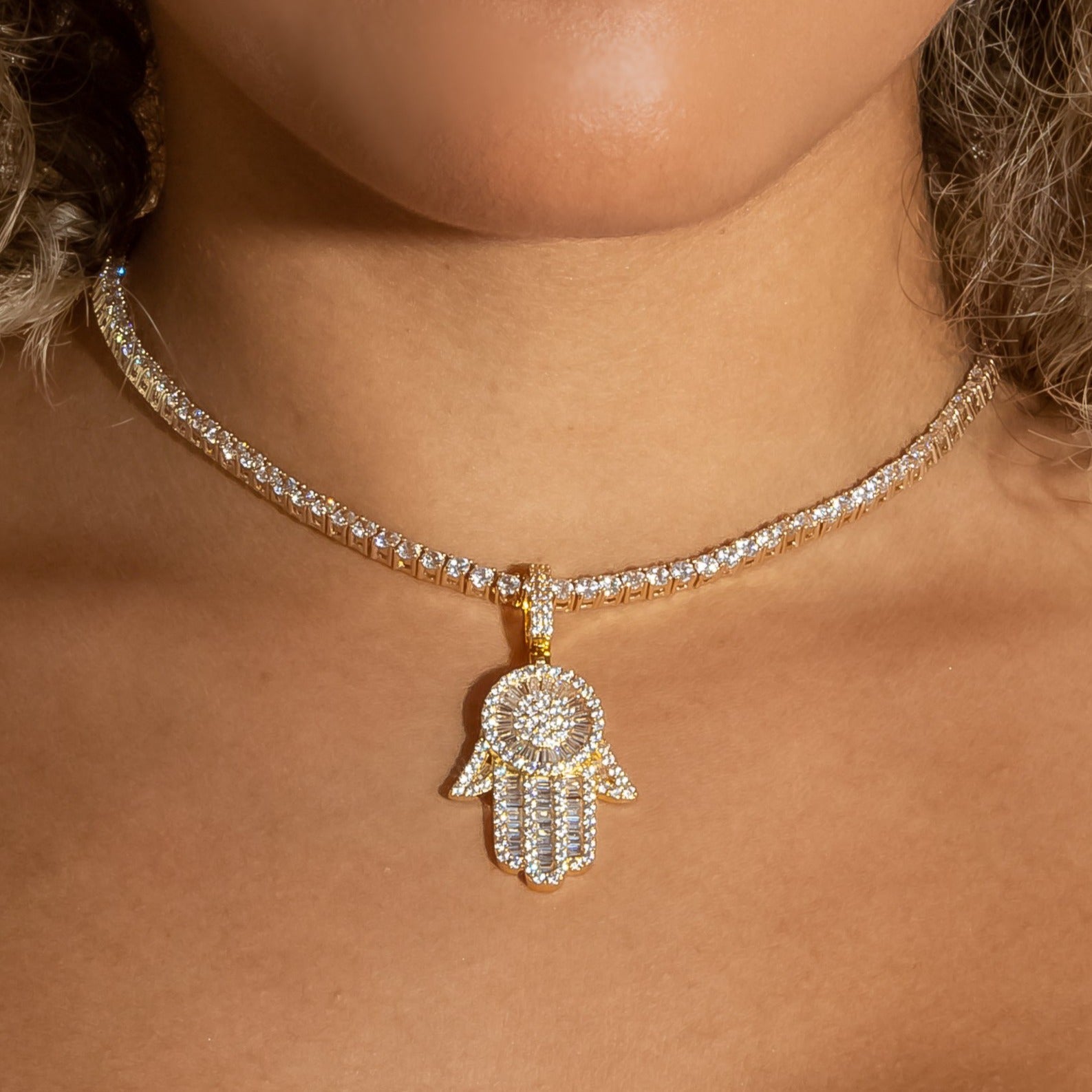 Iced Baguette Diamond Hamsa Hand in Yellow Gold (view 7 of 7) · female-model