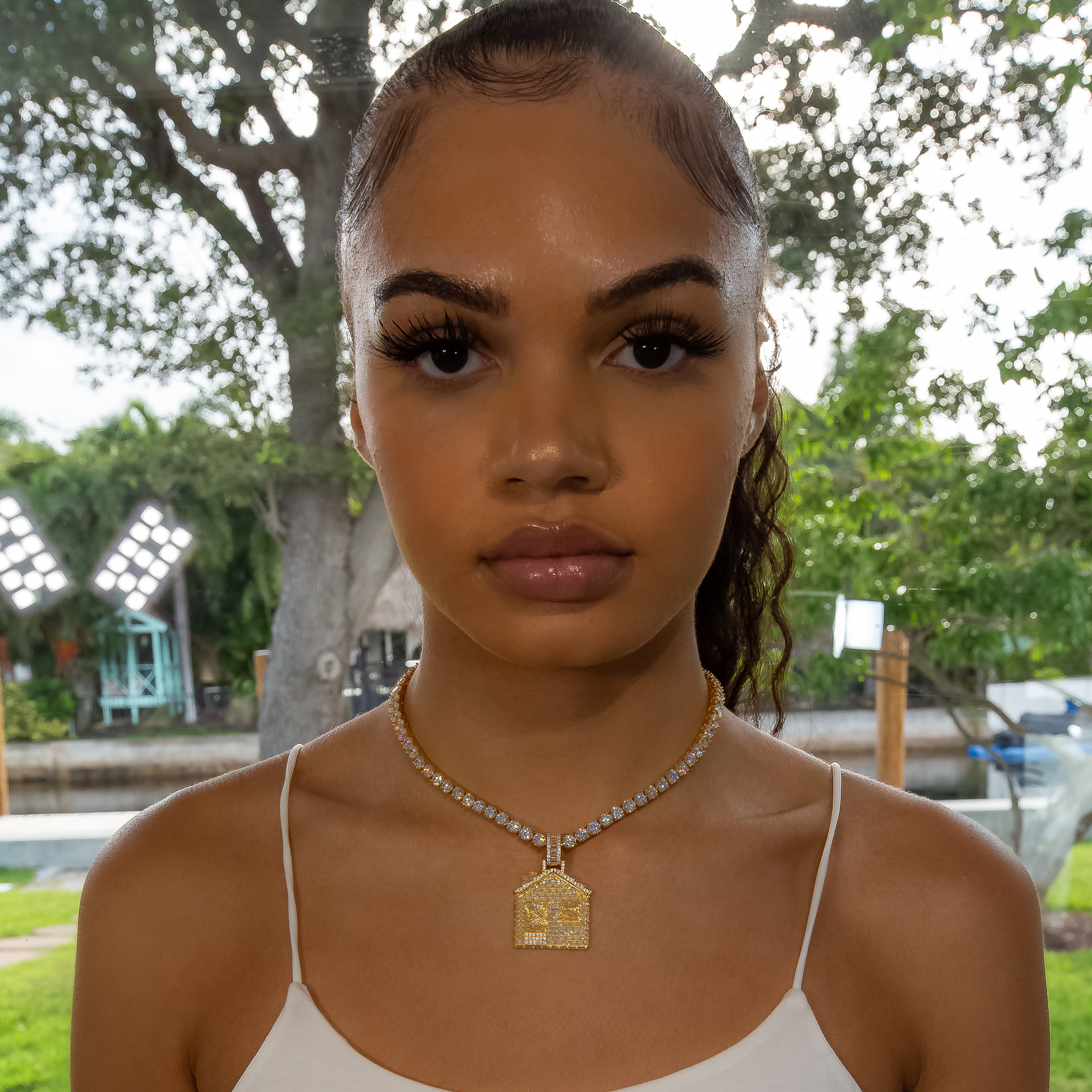 Iced Baguette Diamond Trap House - Yellow Gold (view 2 of 6) · female-model