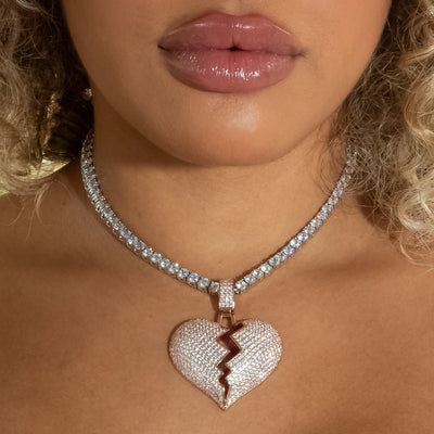 Iced Out Diamond Broken Heart in Rose Gold | SKRT® · female-model