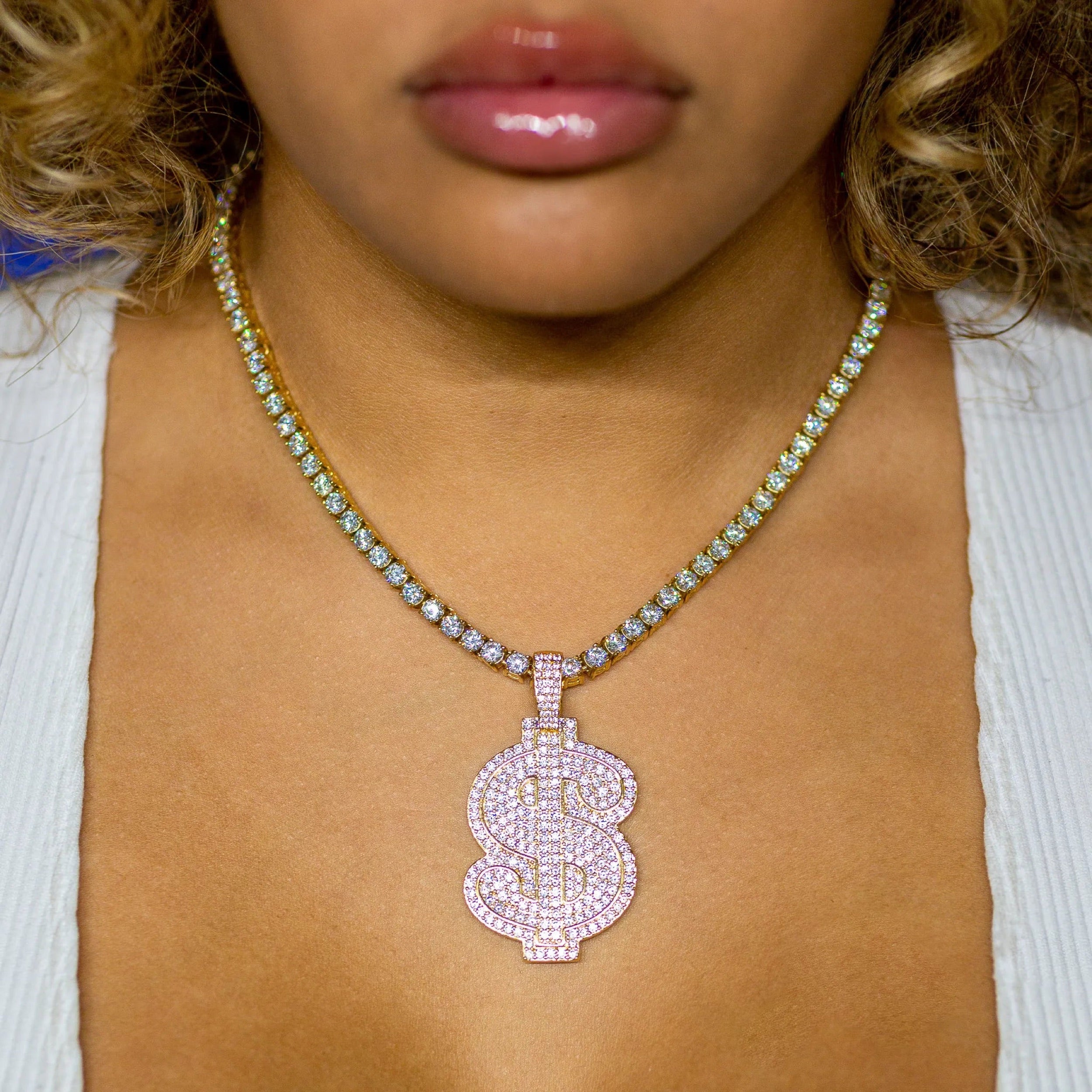 Diamond Dollar Sign in 18K Yellow Gold · female-model