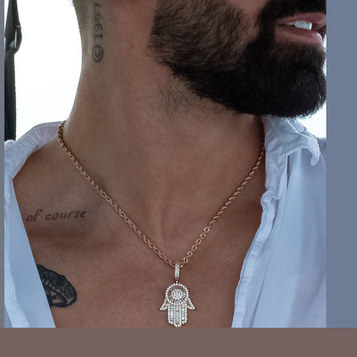 Iced Out Baguette Hamsa Hand in 18K Rose Gold - product image · male-model