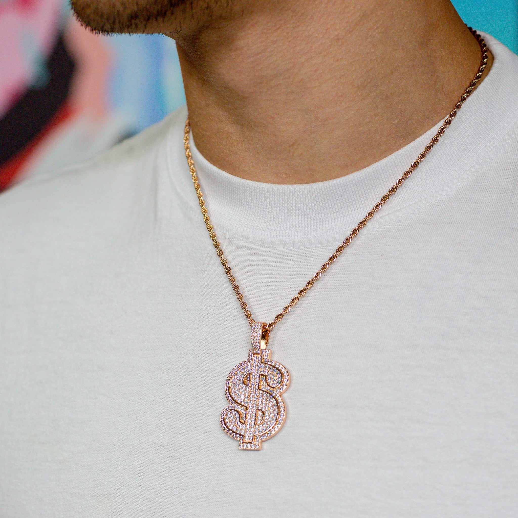 Iced Out Dollar Sign in Rose Gold (view 3 of 3) · male-model