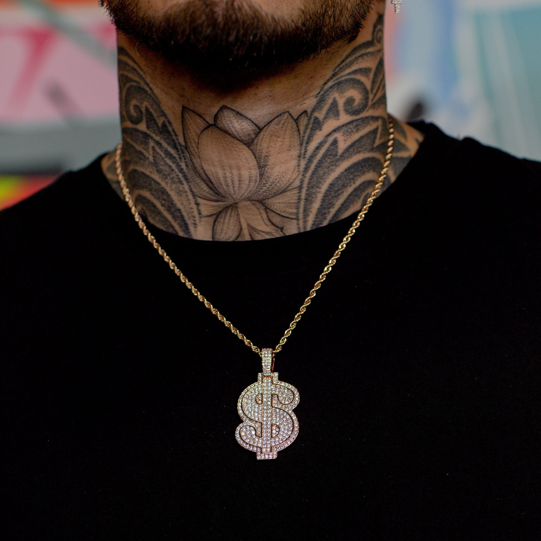 Iced Out Dollar Sign in Rose Gold | SKRT® · male-model