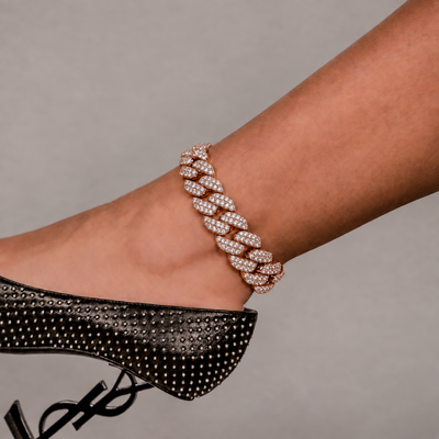 SKRT 18mm Flower Setting Cuban Link Anklet in Rose Gold shown on an ankle.
