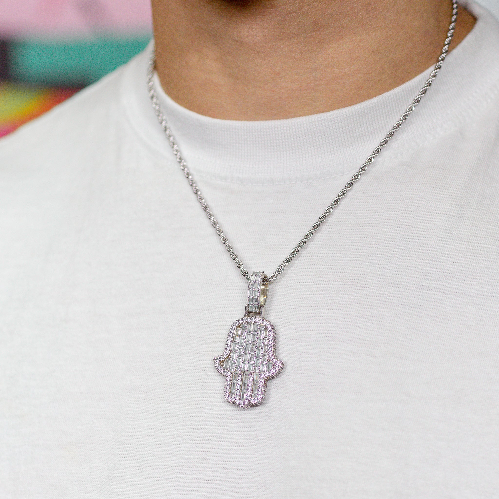 Iced Out Emerald Hamsa Hand in White Gold